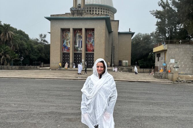 Day Trip From Addis Ababa To Debre Libanos and Portuguese Bridge - Portuguese Bridge: the stone arch, the water below, and the building debate
