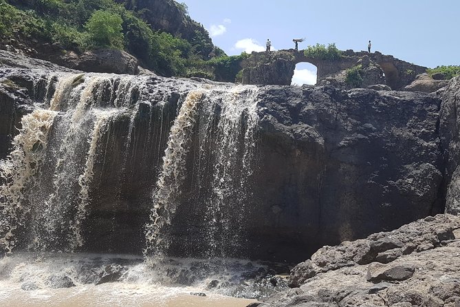 Debre Libanos Monastery and Jemma River Gorge - Day Tour from Addis Ababa - Portuguese Bridge and Jemma River Gorge: historic structure, waterfall views, and gelada odds