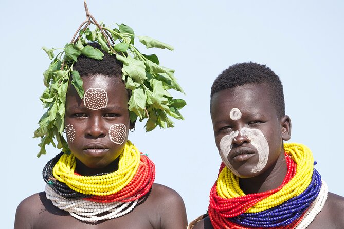 Photography Expeditions to Omo Valley - Day 3: Karo body painting in clay and vegetable pigments, plus bull-jumping rehearsal odds