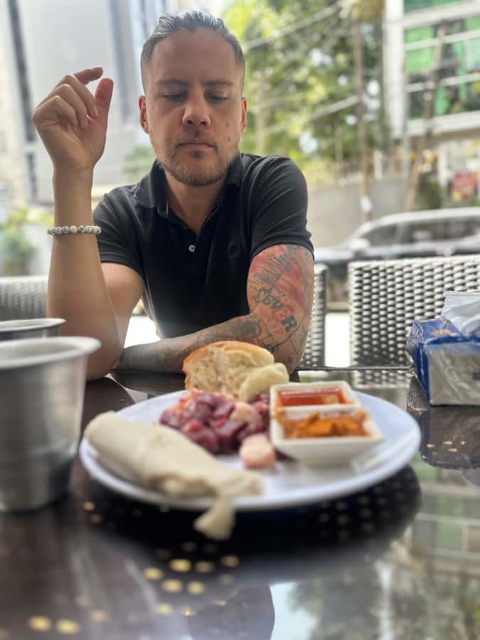 Taste of Addis: A Delicious 3-Hour Journey Ethiopian Flavors - Stop Two: Doro Wat and Tibs, Spicy Chicken and Sautéed Meat